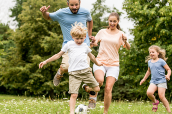 family playing football