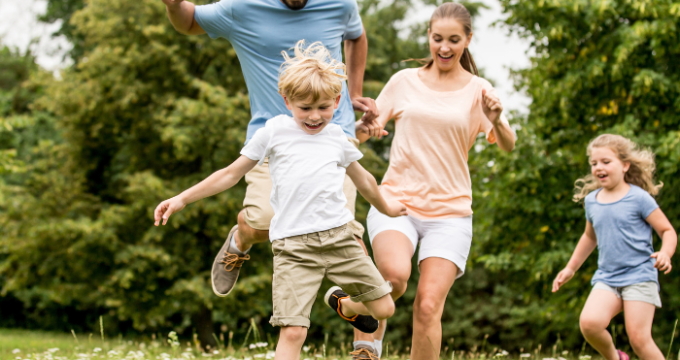 family playing football
