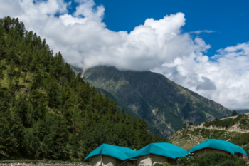 tents in front of mountains