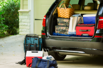 suitcases in back of car